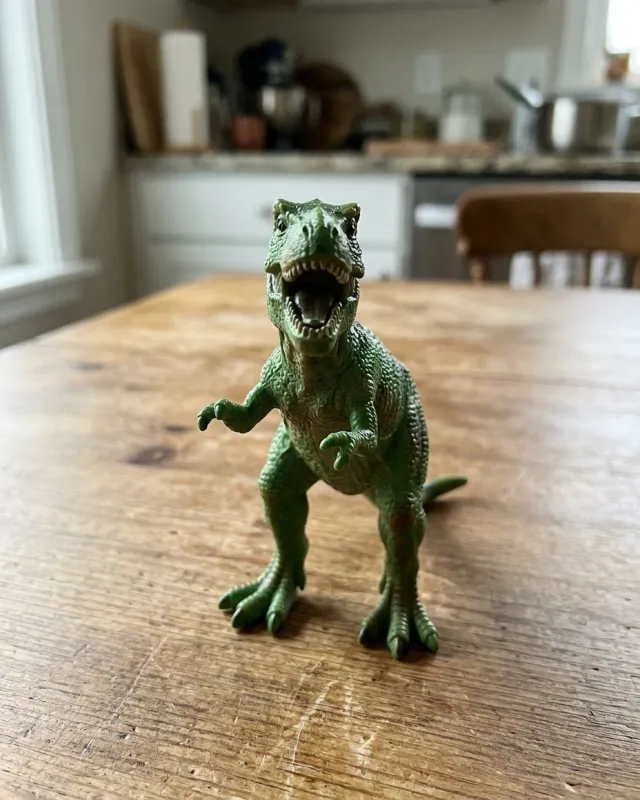 The toy T-Rex photo used as input